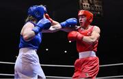 21 January 2023; Aoife O’Rourke of Olympic Boxing Club, Galway, right, and Aoibhe Carabine of Geesala Boxing Club, Mayo, during their middleweight 75kg final bout at the IABA National Elite Boxing Championships Finals at the National Boxing Stadium in Dublin. Photo by Seb Daly/Sportsfile