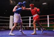 21 January 2023; Aoife O’Rourke of Olympic Boxing Club, Galway, right, and Aoibhe Carabine of Geesala Boxing Club, Mayo, during their middleweight 75kg final bout at the IABA National Elite Boxing Championships Finals at the National Boxing Stadium in Dublin. Photo by Seb Daly/Sportsfile