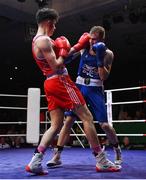 21 January 2023; Dean Walsh of St Ibars/St Josephs Boxing Club, Wexford, right, and Jon McConnell of Holy Trinity Boxing Club, Belfast, during their light middleweight 71kg final bout at the IABA National Elite Boxing Championships Finals at the National Boxing Stadium in Dublin. Photo by Seb Daly/Sportsfile