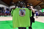 21 January 2023; Jarett Haines of University of Galway Maree holds up a shirt in remembrance of his brother Toine after the Basketball Ireland Pat Duffy National Cup Final match between DBS Éanna and University of Galway Maree at National Basketball Arena in Tallaght, Dublin. Photo by Ben McShane/Sportsfile