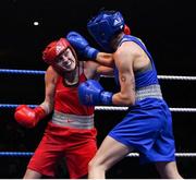 21 January 2023; Michaela Walsh of Emerald ABC, Belfast, left, and Kelsey Leonard of Unit 3 Boxing Club, Kildare, during their featherweight 57kg final bout at the IABA National Elite Boxing Championships Finals at the National Boxing Stadium in Dublin. Photo by Seb Daly/Sportsfile