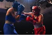 21 January 2023; Michaela Walsh of Emerald ABC, Belfast, right, and Kelsey Leonard of Unit 3 Boxing Club, Kildare, during their featherweight 57kg final bout at the IABA National Elite Boxing Championships Finals at the National Boxing Stadium in Dublin. Photo by Seb Daly/Sportsfile