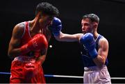 21 January 2023; Sean Mari of Monkstown, Dublin, and Defence Forces Boxing Clubs, right, and Clepson dos Santos of Holy Trinity Boxing Club, Belfast during their flyweight 51kg final bout at the IABA National Elite Boxing Championships Finals at the National Boxing Stadium in Dublin. Photo by Seb Daly/Sportsfile