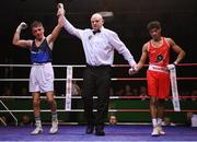 21 January 2023; Sean Mari of Monkstown, Dublin, and Defence Forces Boxing Clubs, left, celebrates after his victory over Clepson dos Santos of Holy Trinity Boxing Club, Belfast in their flyweight 51kg final bout at the IABA National Elite Boxing Championships Finals at the National Boxing Stadium in Dublin. Photo by Seb Daly/Sportsfile