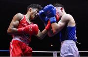 21 January 2023; Clepson dos Santos of Holy Trinity Boxing Club, Belfast, left, and Sean Mari of Monkstown, Dublin, and Defence Forces Boxing Clubs, during their flyweight 51kg final bout at the IABA National Elite Boxing Championships Finals at the National Boxing Stadium in Dublin. Photo by Seb Daly/Sportsfile