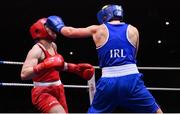 21 January 2023; Grainne Walsh of Spartacus Boxing Club, Offaly, right, and Amy Broadhurst of St Bronagh's ABC, Louth, during their welterweight 66kg final bout at the IABA National Elite Boxing Championships Finals at the National Boxing Stadium in Dublin. Photo by Seb Daly/Sportsfile