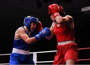 21 January 2023; Grainne Walsh of Spartacus Boxing Club, Offaly, left, and Amy Broadhurst of St Bronagh's ABC, Louth, during their welterweight 66kg final bout at the IABA National Elite Boxing Championships Finals at the National Boxing Stadium in Dublin. Photo by Seb Daly/Sportsfile