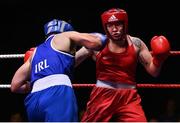 21 January 2023; Grainne Walsh of Spartacus Boxing Club, Offaly, left, and Amy Broadhurst of St Bronagh's ABC, Louth, during their welterweight 66kg final bout at the IABA National Elite Boxing Championships Finals at the National Boxing Stadium in Dublin. Photo by Seb Daly/Sportsfile