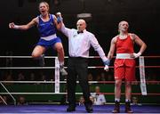 21 January 2023; Grainne Walsh of Spartacus Boxing Club, Offaly, left, celebrates after her victory over Amy Broadhurst of St Bronagh's ABC, Louth, after their welterweight 66kg final bout at the IABA National Elite Boxing Championships Finals at the National Boxing Stadium in Dublin. Photo by Seb Daly/Sportsfile