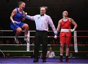 21 January 2023; Grainne Walsh of Spartacus Boxing Club, Offaly, left, celebrates after her victory over Amy Broadhurst of St Bronagh's ABC, Louth, after their welterweight 66kg final bout at the IABA National Elite Boxing Championships Finals at the National Boxing Stadium in Dublin. Photo by Seb Daly/Sportsfile