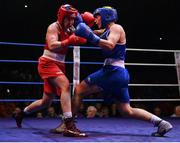 21 January 2023; Amy Broadhurst of St Bronagh's ABC, Louth, left, and Grainne Walsh of Spartacus Boxing Club, Offaly, during their welterweight 66kg final bout at the IABA National Elite Boxing Championships Finals at the National Boxing Stadium in Dublin. Photo by Seb Daly/Sportsfile