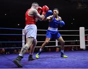 21 January 2023; Keelyn Cassidy of Saviours Crystal Boxing Club, Waterford, right, and Jason Clancy of Sean McDermott Boxing Club, Leitrim, during their light heavyweight 80kg final bout at the IABA National Elite Boxing Championships Finals at the National Boxing Stadium in Dublin. Photo by Seb Daly/Sportsfile