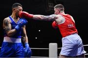 21 January 2023; Jason Clancy of Sean McDermott Boxing Club, Leitrim, right, and Keelyn Cassidy of Saviours Crystal Boxing Club, Waterford, during their light heavyweight 80kg final bout at the IABA National Elite Boxing Championships Finals at the National Boxing Stadium in Dublin. Photo by Seb Daly/Sportsfile