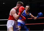 21 January 2023; Jason Clancy of Sean McDermott Boxing Club, Leitrim, left, and Keelyn Cassidy of Saviours Crystal Boxing Club, Waterford, during their light heavyweight 80kg final bout at the IABA National Elite Boxing Championships Finals at the National Boxing Stadium in Dublin. Photo by Seb Daly/Sportsfile