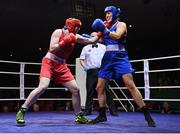 21 January 2023; Tiffany O’Reilly of Portlaoise and Defence Forces Boxing Clubs, left, and Christina Desmond of Dungarvan and Garda Boxing Clubs, during their light middleweight 70kg final bout at the IABA National Elite Boxing Championships Finals at the National Boxing Stadium in Dublin. Photo by Seb Daly/Sportsfile