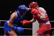 21 January 2023; Christina Desmond of Dungarvan and Garda Boxing Clubs, left, and Tiffany O’Reilly of Portlaoise and Defence Forces Boxing Clubs, during their light middleweight 70kg final bout at the IABA National Elite Boxing Championships Finals at the National Boxing Stadium in Dublin. Photo by Seb Daly/Sportsfile