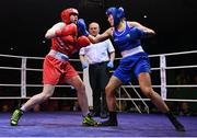 21 January 2023; Christina Desmond of Dungarvan and Garda Boxing Clubs, left, and Tiffany O’Reilly of Portlaoise and Defence Forces Boxing Clubs, during their light middleweight 70kg final bout at the IABA National Elite Boxing Championships Finals at the National Boxing Stadium in Dublin. Photo by Seb Daly/Sportsfile