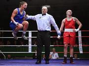 21 January 2023; Grainne Walsh of Spartacus Boxing Club, Offaly, left, celebrates after her victory over Amy Broadhurst of St Bronagh's ABC, Louth, in their welterweight 66kg final bout at the IABA National Elite Boxing Championships Finals at the National Boxing Stadium in Dublin. Photo by Seb Daly/Sportsfile