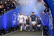 21 January 2023; Racing 92 captain Gael Fickou and Leinster captain Garry Ringrose, with match day mascots Lauren Campion and Jack Byrne, walk out before the Heineken Champions Cup Pool A Round 4 match between Leinster and Racing 92 at Aviva Stadium in Dublin. Photo by Harry Murphy/Sportsfile