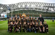 21 January 2023; The Westmanstown team with Leo the Lion, Cormac Foley and Martin Moloney before the Bank of Ireland Half-time Minis at Heineken Champions Cup Pool A Round 4 match between Leinster and Racing 92 at Aviva Stadium in Dublin. Photo by Harry Murphy/Sportsfile