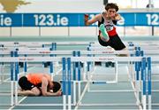 22 January 2023; Ben Donovan of Cork Track Club, right, competes in the men's 60m hurdles as Darragh Miniter of Nenagh Olympic, Tipperary, reacts during day two of the 123.ie National Indoor League Round 2 & Combined Events at TUS Athlone in Westmeath. Photo by Harry Murphy/Sportsfile
