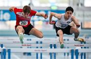 22 January 2023; Michael Kent of DMP AC, Wexford, left, and Sean Mc Cabe of Sligo AC, compete in the 60m hurdle event of the youth men's heptathlon  during day two of the 123.ie National Indoor League Round 2 & Combined Events at TUS Athlone in Westmeath. Photo by Harry Murphy/Sportsfile