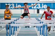 22 January 2023; Mark Loughran of Trim AC, Meath, centre, competes in the 60m hurdle event of the youth men's heptathlon during day two of the 123.ie National Indoor League Round 2 & Combined Events at TUS Athlone in Westmeath. Photo by Harry Murphy/Sportsfile
