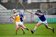 22 January 2023; Joey Keenaghan of Offaly in action against Patrick Purcell of Laois during the Walsh Cup Group 2 Round 3 match between Offaly and Laois at Glenisk O'Connor Park in Tullamore, Offaly. Photo by Tyler Miller/Sportsfile