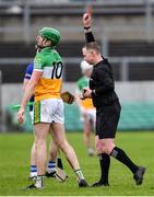 22 January 2023; Referee Chris Mooney shows a red card to Brian Duignan of Offaly during the Walsh Cup Group 2 Round 3 match between Offaly and Laois at Glenisk O'Connor Park in Tullamore, Offaly. Photo by Tyler Miller/Sportsfile
