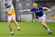 22 January 2023; Joe Hoctor of Offaly in action against Padraig Delaney of Laois during the Walsh Cup Group 2 Round 3 match between Offaly and Laois at Glenisk O'Connor Park in Tullamore, Offaly. Photo by Tyler Miller/Sportsfile