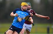 22 January 2023; Daire Gray of Dublin in action against Mark Cunningham of Westmeath during the Walsh Cup Group 1 Round 3 match between Westmeath and Dublin at Kinnegad GAA Club in Kinnegad, Westmeath. Photo by Ben McShane/Sportsfile