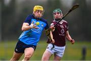 22 January 2023; Daire Gray of Dublin in action against Mark Cunningham of Westmeath during the Walsh Cup Group 1 Round 3 match between Westmeath and Dublin at Kinnegad GAA Club in Kinnegad, Westmeath. Photo by Ben McShane/Sportsfile