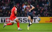 22 January 2023; Antoine Frisch of Munster in action against Pita Ahki of Toulouse during the Heineken Champions Cup Pool B Round 4 match between Toulouse and Munster at Stade Ernest Wallon in Toulouse, France. Photo by Brendan Moran/Sportsfile