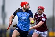 22 January 2023; Colin Currie of Dublin in action against Darragh Egerton of Westmeath during the Walsh Cup Group 1 Round 3 match between Westmeath and Dublin at Kinnegad GAA Club in Kinnegad, Westmeath. Photo by Ben McShane/Sportsfile