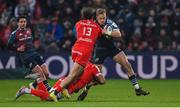 22 January 2023; Mike Haley of Munster is tackled by Pita Ahki and Pierre-Louis Barassi of Toulouse during the Heineken Champions Cup Pool B Round 4 match between Toulouse and Munster at Stade Ernest Wallon in Toulouse, France. Photo by Brendan Moran/Sportsfile