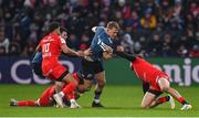 22 January 2023; Mike Haley of Munster is tackled by Pita Ahki and Pierre-Louis Barassi of Toulouse during the Heineken Champions Cup Pool B Round 4 match between Toulouse and Munster at Stade Ernest Wallon in Toulouse, France. Photo by Brendan Moran/Sportsfile