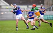 22 January 2023; Stephen Maher of Laois in action against Padraig Cantwell of Offaly during the Walsh Cup Group 2 Round 3 match between Offaly and Laois at Glenisk O'Connor Park in Tullamore, Offaly. Photo by Tyler Miller/Sportsfile