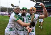 22 January 2023; Shamrocks Ballyhale players, left to right, TJ Reid, Joey Holden, and Richie Reid celebrate after the AIB GAA Hurling All-Ireland Senior Club Championship Final match between Shamrocks Ballyhale of Kilkenny and Dunloy Cuchullains of Antrim at Croke Park in Dublin. Photo by Daire Brennan/Sportsfile
