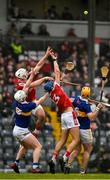 22 January 2023; Cork players Declan Dalton and Colin Walsh and Tipperary players Michael Breen and Pauric Campion challenge for the sliotar during the Co-Op Superstores Munster Hurling League Final match between Cork and Tipperary at Páirc Ui Rinn in Cork. Photo by Seb Daly/Sportsfile