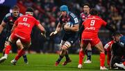 22 January 2023; Tadhg Beirne of Munster in action against Alexandre Roumat and Antoine Dupont of Toulouse during the Heineken Champions Cup Pool B Round 4 match between Toulouse and Munster at Stade Ernest Wallon in Toulouse, France. Photo by Brendan Moran/Sportsfile