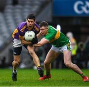 22 January 2023; Rory O'Carroll of Kilmacud Crokes gets to the ball before Emmett Bradley of Watty Graham's Glen during the AIB GAA Football All-Ireland Senior Club Championship Final match between Watty Graham's Glen of Derry and Kilmacud Crokes of Dublin at Croke Park in Dublin. Photo by Ramsey Cardy/Sportsfile