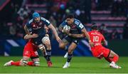 22 January 2023; Malakai Fekitoa of Munster is tackled by Romain Ntamack of Toulouse during the Heineken Champions Cup Pool B Round 4 match between Toulouse and Munster at Stade Ernest Wallon in Toulouse, France. Photo by Brendan Moran/Sportsfile