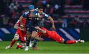 22 January 2023; Malakai Fekitoa of Munster breaks the tackle of Romain Ntamack of Toulouse during the Heineken Champions Cup Pool B Round 4 match between Toulouse and Munster at Stade Ernest Wallon in Toulouse, France. Photo by Brendan Moran/Sportsfile