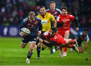 22 January 2023; Craig Casey of Munster beats the tackle of Juan Cruz Mallia of Toulouse during the Heineken Champions Cup Pool B Round 4 match between Toulouse and Munster at Stade Ernest Wallon in Toulouse, France. Photo by Brendan Moran/Sportsfile