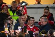 22 January 2023; Sean O'Donoghue of Cork lifts the trophy after his side's victory in the Co-Op Superstores Munster Hurling League Final match between Cork and Tipperary at Páirc Ui Rinn in Cork. Photo by Seb Daly/Sportsfile