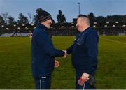 22 January 2023; Tipperary manager Liam Cahill, left, and Cork manager Pat Ryan shake hands after the Co-Op Superstores Munster Hurling League Final match between Cork and Tipperary at Páirc Ui Rinn in Cork. Photo by Seb Daly/Sportsfile