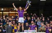 22 January 2023; Rory O'Carroll of Kilmacud Crokes lifts the Andy Merrigan Cup after his side's victory in the AIB GAA Football All-Ireland Senior Club Championship Final match between Watty Graham's Glen of Derry and Kilmacud Crokes of Dublin at Croke Park in Dublin. Photo by Ramsey Cardy/Sportsfile