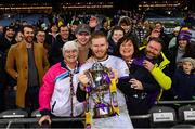 22 January 2023; Kilmacud Crokes goalkeeper Conor Ferris celebrates with the Andy Merrigan Cup, alongside family and friends after the AIB GAA Football All-Ireland Senior Club Championship Final match between Watty Graham's Glen of Derry and Kilmacud Crokes of Dublin at Croke Park in Dublin. Photo by Piaras Ó Mídheach/Sportsfile