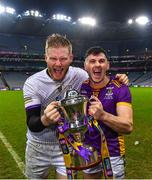 22 January 2023; Kilmacud Crokes goalkeeper Conor Ferris celebrates with the Andy Merrigan Cup and team-mate Shane Walsh after the AIB GAA Football All-Ireland Senior Club Championship Final match between Watty Graham's Glen of Derry and Kilmacud Crokes of Dublin at Croke Park in Dublin. Photo by Piaras Ó Mídheach/Sportsfile
