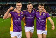 22 January 2023; Kilmacud Crokes players, from left, Paul Mannion, Shane Walsh and Cian O'Connor celebrate after the AIB GAA Football All-Ireland Senior Club Championship Final match between Watty Graham's Glen of Derry and Kilmacud Crokes of Dublin at Croke Park in Dublin. Photo by Ramsey Cardy/Sportsfile